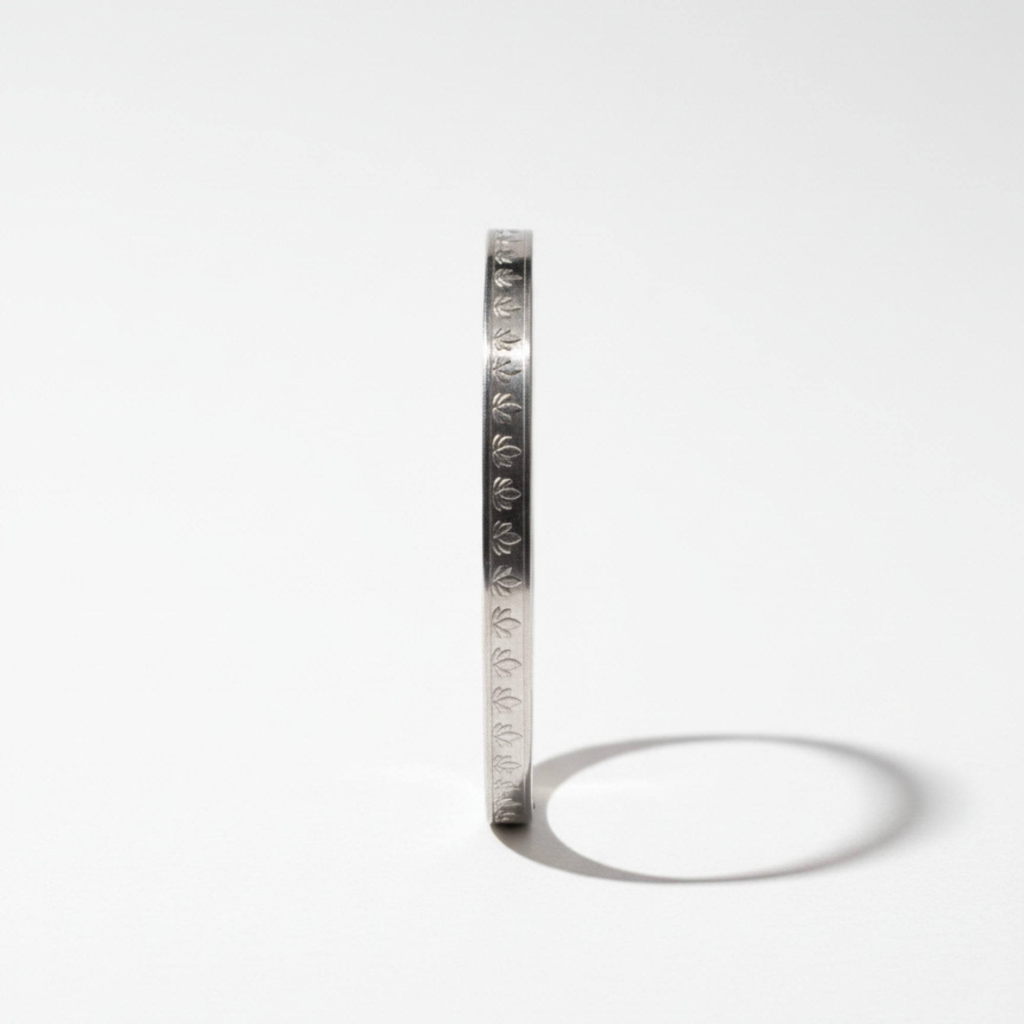 Myrithra Adjustable Stainless‑Steel Bracelet for Women | Silver‑Tone Engraved Bangle