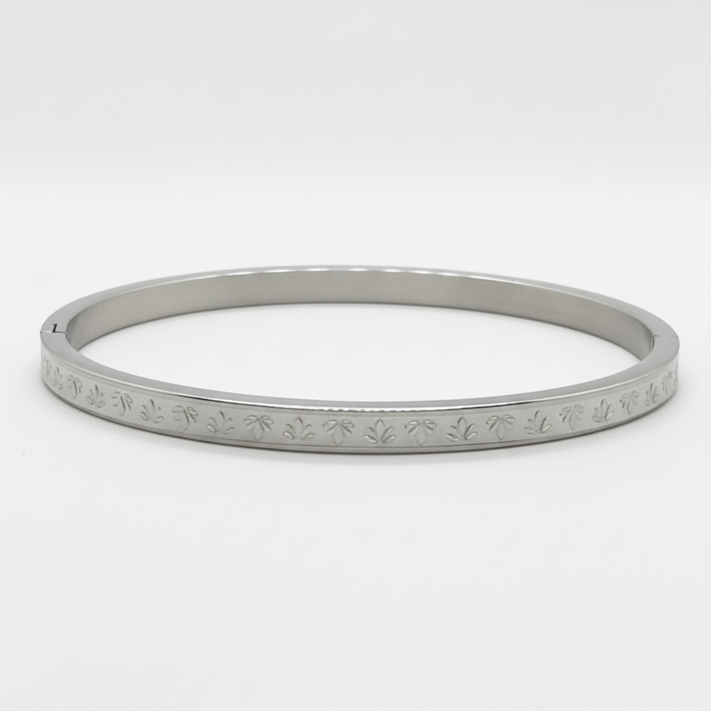 Myrithra Adjustable Stainless‑Steel Bracelet for Women | Silver‑Tone Engraved Bangle